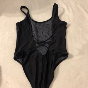 Black volcom one piece